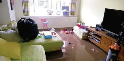  ??  ?? ●●The home of Sarah and Matt Bickley in Offerton, Stockport, during the floods