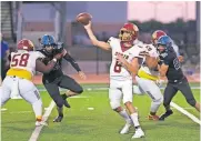  ?? [DOUG HOKE/ THE OKLAHOMAN] ?? Putnam North quarterbac­k Carson Laverty (6) gets plenty of protection from his offensive line in an Oct. 5 win at Deer Creek.