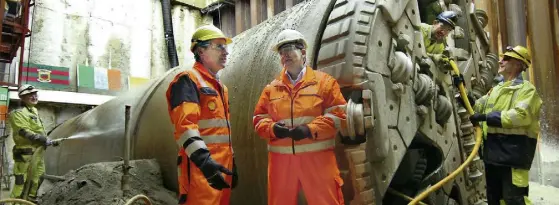  ??  ?? Workers with the boring machine which created a 4.9km tunnel linking the Corrib field to a gas-processing terminal in Co Mayo