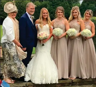  ?? ?? Wedding joy: From left to right, wife Julia, Sir David, bride Alexandra and daughters Flo, Katie and Sarah in August