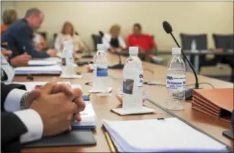  ?? RICK KAUFFMAN — DIGITAL FIRST MEDIA ?? Bottled water from the Chester Water Authority was handed out during a board meeting Thursday where residents raised concerns over a potential sale of the utility and a potential raise in costs to customers.