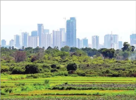  ?? HONG MENEA ?? View of tall buildings from a distance in Phnom Penh on May 21.