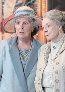  ?? ?? Penelope Wilton as Isobel Merton and Maggie Smith as the imperious Dowager Violet Grantham.