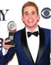  ??  ?? Ben Platt poses in the press room with the award for best performanc­e by an actress in a leading role in a musical for "Hello, Dolly!".