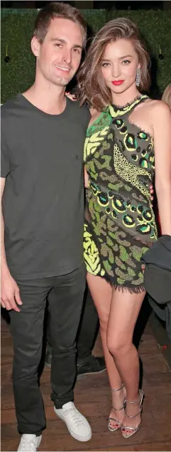  ??  ?? Bumper pay packet: Evan Spiegel with wife Miranda Kerr