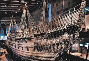  ?? DOMINIC ARIZONA BONUCCELLI/RICK STEVES’ EUROPE ?? The enormous Vasa, decorated with hundreds of wooden statues, was designed to show the power of Sweden’s king. The top-heavy ship sank to the bottom of Stockholm’s harbor just minutes into her maiden voyage.