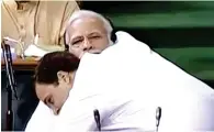  ?? PTI ?? NONPLUSSED MOMENT: Rahul Gandhi hugs Narendra Modi after his speech in the Lok Sabha in New Delhi on Friday. —