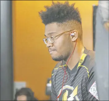  ??  ?? Jonathan Hill, 18, of Cincinnati, vies for prize money at the GameWorks tournament.