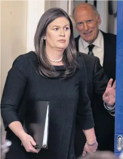  ??  ?? DUCK FOR COVER: White House press secretary Sarah Huckabee Sanders arrives for the daily press briefing at the White House.