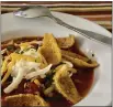  ?? PHOTO BY CATHY THOMAS ?? Ina Garten’s Chicken Chili can be topped with onions, cheese, sour cream and tortilla chips.