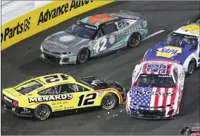  ?? AP PHOTO/MARK J. TERRILL ?? NASCAR Cup Series driver Ryan Blaney (12) spins out and is hit by Daniel Suarez (99) during the Busch Light Clash NASCAR exhibition auto race at Los Angeles Memorial Coliseum Sunday, Feb. 5, 2023, in Los Angeles.