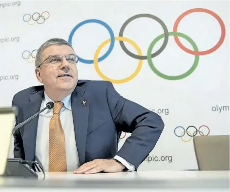  ?? JEAN-CHRISTOPHE BOTT/THE ASSOCIATED PRESS ?? Internatio­nal Olympic Committee President Thomas Bach attends a press conference after an executive board meeting, at the Olympic Museum, in Lausanne, Switzerlan­d, Friday. The IOC added 3-on3 basketball and BMX Freestyle cycling to its roster of sports...