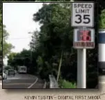  ??  ?? New electronic signs monitor the speed of drivers on Township Line Road in Upper Darby.