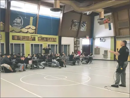  ?? COURTESY PHOTOGRAPH ?? Lodi Police Department School Resource Officer Brannon Haro speaks to students during career day at Lodi Middle School.