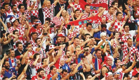  ?? Reuters ?? Croatian fans celebrate after their team’s brilliant win over England on Wednesday.