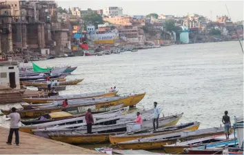  ?? — PTI ?? Boats anchored at a Ganga ghat due to Covid-19 pandemic in Varanasi on Friday.