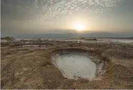  ?? (Yaniv Nadav/Flash90) ?? A SINKHOLE NEAR the Dead Sea.