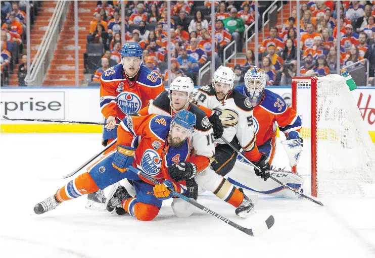  ?? — GETTY IMAGES FILES ?? Oilers defenceman Kris Russell goes down to block a shot during the playoffs against Anaheim, something he led the team in during the regular season.