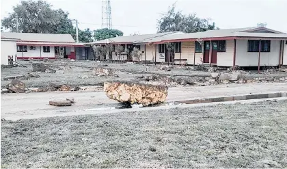  ?? Photos / supplied ?? (Clockwise from top) Damage in the village of Pangai on Ha'apai island; tsunami surges filled a parking lot and lowlying streets and set cars afloat at the Santa Cruz Harbour in California; the volcano on Friday; and Saturday’s explosion.