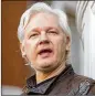  ?? DOMINIC LIPINSKI / PA WIRE / ABACA PRESS 2017 ?? Julian Assange speaks to the media in May from the balcony of the Ecuadorean Embassy in London.