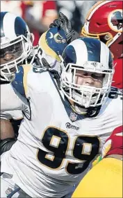  ?? Luis Sinco Los Angeles Times ?? RAMS DEFENSIVE LINEMAN Aaron Donald will earn $6.9 million in 2018 as part of rookie contract.