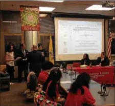  ?? SULAIMAN ABDUR-RAHMAN - THE TRENTONIAN ?? Newly elected Lawrence school board members (from left) Kelly Edelstein, Jose “Max” Ramos and Michele Bowes take the oath of office Wednesday, Jan. 10, 2018, at the board of education’s reorganiza­tion meeting.