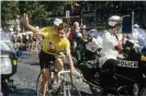  ?? Photograph: L'Equipe/Offside ?? Jeannie Longo celebrates after winning the Women’s Tour de France in 1987 – the race folded due to financial difficulti­es after the 1989 edition.