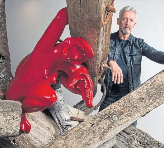  ??  ?? VARIED WORK:
David Mach unveils his Brexit-themed sculpture Against The Tide at the launch of Dunfermlin­e’s Outwith Festival in 2017.