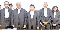  ?? — Bernama photo ?? Tan Sri Richard Malanjum (center) with Court of Appeal president Tan Sri Ahmad Maarop (second left), Chief Judge of Sabah and Sarawak Datuk David Wong Dak Wah (second, right), Judge of The Court of Appeal Datuk Wira Mohtarudin Baki (left) and Judge of The High Court of Sabah and Sarawak Datuk Yew Jen Kie (right) after the swearing in.