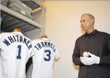  ?? THE ASSOCIATED PRESS ?? Alan Trammell, a member of the class of 2018 going into baseball’s Hall of Fame, holds a ball from the 1995 game where he and teammate Lou Whitaker set a record for most American League games played by teammates. Trammell, 60, played his whole career...