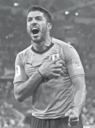  ?? AP ?? Uruguay's Luis Suarez celebrates after winning Saturday’s match against Portugal at the 2018 World Cup in Sochi, Russia.