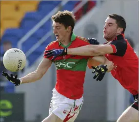  ??  ?? Rathnew’s Jody Merrigan comes under pressure from Coolkenno’s Philip Timmons during the SFC in Joule Park, Aughrim. Picture: Garry O’Neill