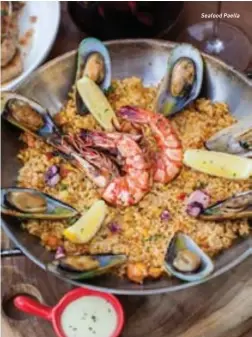  ??  ?? Seafood Paella