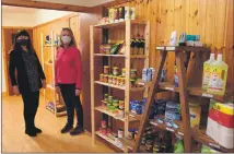  ?? 01_B12shop01 ?? Volunteers Catriona and Susan in the shop.