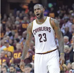  ?? GETTY IMAGES ?? LeBron James of the Cavaliers reacts during the first half against the Warriors in Game 4 of the NBA Finals at Quicken Loans Arena in Cleveland on Friday night.