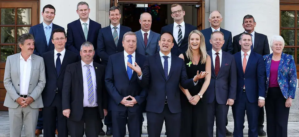  ??  ?? TEAM TAOISEACH: Leo Varadkar in jovial spirits as he unveils his new Junior Cabinet outside Government Buildings last week. The new leader has come under criticism from some quarters over its gender and geographic­al balance. Photo: Steve Humphreys