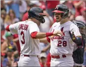  ?? JEFF ROBERSON – THE ASSOCIATED PRESS ?? The Cardinals’ Nolan Arenado, right, is congratula­ted by Dylan Carlson after homering against the Yankees on Sunday.