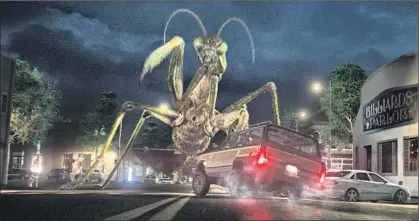  ??  ?? CREATURES FROM THE “Goosebumps” books come to life in the movie adaptation, including a giant praying mantis.