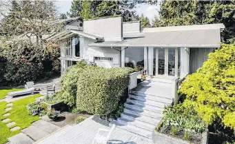  ??  ?? This 3,000-square-foot waterfront beach house in West Vancouver was designed by renowned B.C. architect Ron Thom. Built 51 years ago it recently hit the real estate market for the first time.