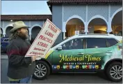  ?? JEFF GRITCHEN — STAFF PHOTOGRAPH­ER ?? Brad Whitfield, who plays Lord Cedric and Lord Marshall, protests at Medieval Times in Buena Park on Wednesday.