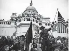  ?? GETTY IMAGES ?? Pro-Trump supporters storm the U.S. Capitol on Jan. 6, 2021, in Washington to protest the ratification of then-president-elect Joe Biden’s Electoral College victory. A year and a half later, roughly 70% of Republican­s don’t see Biden as the 2020 election’s legitimate winner.