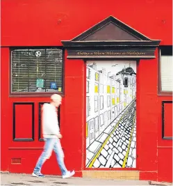  ?? Picture: Mhairi Edwards. ?? Shutters on the door to a pub in Albert Street, part of the Openclose project.