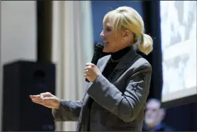  ?? (AP/Matt Freed) ?? Activist Erin Brockovich speaks Friday during a town hall meeting concerning the Feb. 3 Norfolk Southern freight train derailment in East Palestine, Ohio.