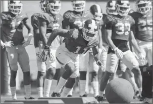  ?? NWA Democrat-Gazette/Charlie Kaijo ?? PICKING BACK UP: Arkansas Razorbacks defensive back Ryan Pulley (11) runs drills during a football practice, Saturday on the University of Arkansas practice field in Fayettevil­le.