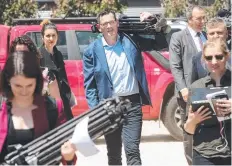  ?? Picture: ALISON WYND ?? OFF-LIMITS: Premier Daniel Andrews arrives at Ravens Creek Farm in Moriac with a media escort.