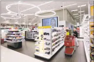  ?? Eric Gay / Associated Press ?? Shoppers look through the cosmetic department at a Target store in San Antonio.