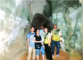  ??  ?? The Omoyon family members (standing from left to right) Patrick, Bettina, Edilee, and Rico, in the famous Onoda Cave, together with a tour guide.