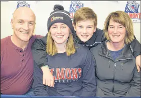  ?? JOEY SMITH/TRURO NEWS ?? Maddie Quinn is thrilled to be pursuing a college education south of the border. Quinn will attend Belmont University in Nashville where she will work toward a nursing degree and throw javelin for the Bruins track and field team. A letter of intent signing event was held recently at CEC. With Maddie are her parents Paul, Natasha Fraser and brother Logan.