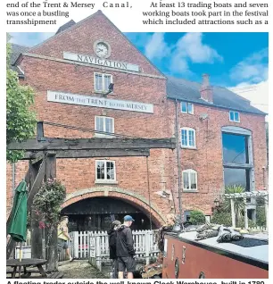  ?? ?? A floating trader outside the well-known Clock Warehouse, built in 1780 and now a popular eating place.