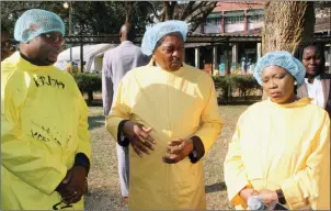  ?? — (Picture by Innocent Makawa) ?? First Lady Auxillia Mnangagwa is briefed by Health and Child Care Minister Dr Obadiah Moyo (centre) while Primary and Secondary Education Minister Professor Paul Mavima looks on during a tour at Beatrice Road Infectious Diseases Hospital in Mbare, Harare, yesterday.